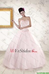 2015 Modest rosa claro Vestidos de quinceañera con apliques