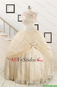 Apliques elegantes 2015 Champán vestido de quinceañera con Wraps