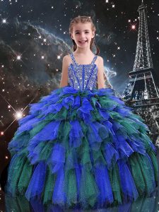Las correas asombrosas sin mangas atan para arriba el vestido del desfile de la niña azul Tulle