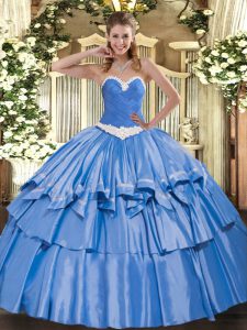 Impresionantes vestidos de bola azules cariño sin mangas de organza y tafetán longitud del piso apliques con cordones y capas rizadas dulces 16 vestidos