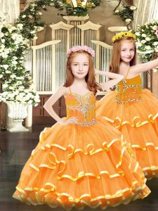 Deslumbrante naranja sin mangas abalorios y volantes capas hasta el suelo vestido de desfile de niñas pequeñas