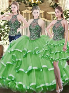 El piso sin mangas vintage rebordea y las capas con volantes atan para arriba el vestido de fiesta vestido de fiesta con verde