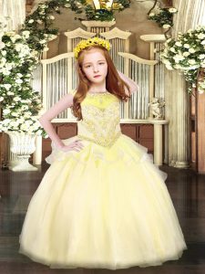 vestido de concurso de niños de color amarillo claro abalorios sin mangas hasta el suelo