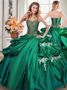 El tafetán sin mangas del cordón atan para arriba el rebordear y los appliques y recogen el vestido de quinceanera en verde oscuro