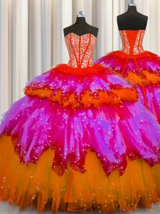 El bling-bling conveniente visibles que deshuesa el rebordear sin mangas y las colmenas y las capas y los cequis rizados atan para arriba el vestido del baile de fin de curso del vestido de bola