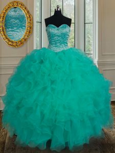 Los vestidos de bola turquesa hermosos de la longitud sin mangas del piso del organza del amor atan para arriba el rebordear y las colmenas 15 vestido de quinceanera