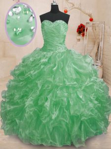 La longitud sin mangas del piso que rebordea y las colmenas atan para arriba los vestidos de bola del membrillo con verde