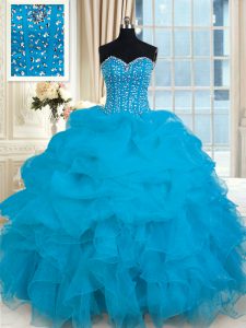 La longitud sin mangas del piso del bebé azul que rebordea y las colmenas atan para arriba los vestidos de la quinceañera
