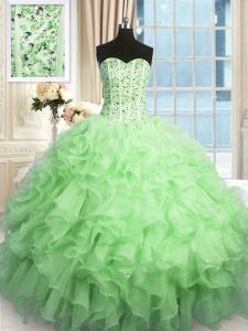 Longitud sin mangas del piso que rebordea y los colmillos atan para arriba los vestidos de bola del membrillo con el verde de manzana