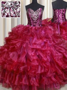 La longitud sin mangas del piso del color de rosa caliente que rebordea y las colmenas atan para arriba el vestido dulce 16