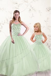 Los vestidos de bola maravillosos de la manzana verde sin mangas de Tulle del amor rebordean la longitud del piso atan para arriba los vestidos dulces 16