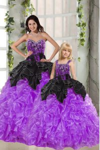 Sophisticated negro y púrpura ata el vestido del quinceanera que rebordea y ruffles la longitud sin mangas del piso